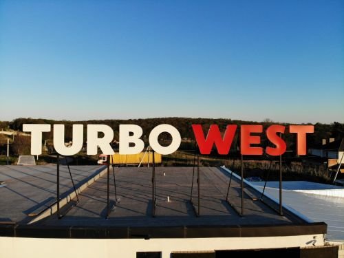 Вивіска для "Turbo West"